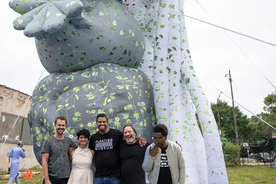 Jeremiah Hulsebos-Spofford, Kushala Vora, Faheem Majeed, Andrew Schachman, and Avery R. Young pose in front of Vora's The Garden, 2022.